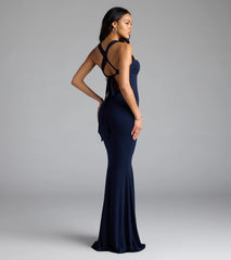 Own the spotlight in the Nicola Strappy Tie-Back Mermaid Dress, a navy blue formal dress crafted to deliver luxe style for autumn weddings, Military Balls, or any special event.
