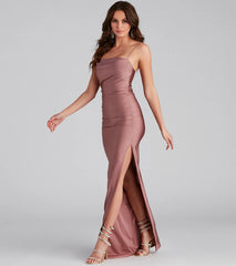 The Ella Cowl Neck Satin Dress is a flowy, mauve maxi dress that moves with you from sunny days to elevated nights in effortless style.