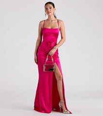 Turn heads at Prom 2025 in this fuchsia prom dress, where statement-making details meet the iconic style of the Lucille Formal Satin Mermaid Dress .