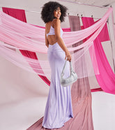 A stunning pick for an engagement photoshoot outfit or autumn wedding guest dress, this fall formal dress showcases the Rowan Formal Glitter Ruched Mermaid Dress in lavender with a graceful silhouette that captures the moment.