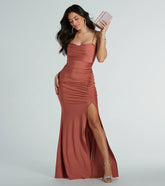 Turn heads at Prom 2025 in this rose gold prom dress, where statement-making details meet the iconic style of the Marsha Cowl Neck Mermaid Formal Dress .