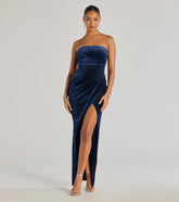 Turn heads at Prom 2025 in this navy blue prom dress, where statement-making details meet the iconic style of the Cordelia Velvet Glitter Long Wrap Dress .