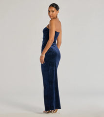 Step into the Prom 2025 dance in the Cordelia Velvet Glitter Long Wrap Dress in navy, a stunning blue prom dress designed to complement any theme with its timeless allure and statement-making style.