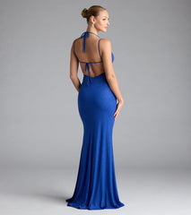 Turn heads at Prom 2025 in this royal blue prom dress, where statement-making details meet the iconic style of the Ariadna Strappy Open Back Slit Glitter Formal Dress.