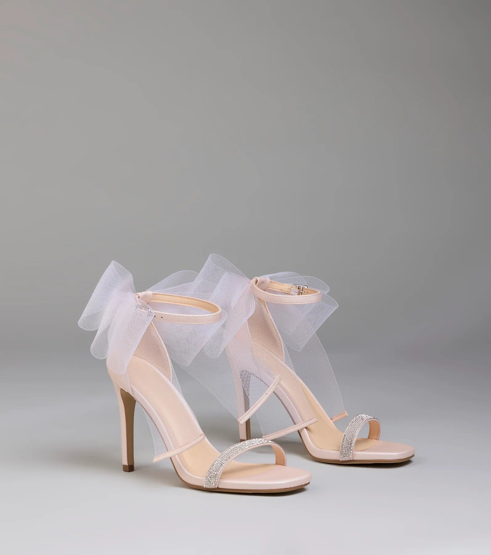 Style made simple with the Tied With A Bow Stiletto Heels in pink, trendy women’s shoes that take your outfit from basic to bold in one step.