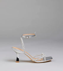 Elevate warm-weather looks with Fab Icon Butterfly Rhinestone Stiletto Heels in silver, a pair of trendy sandals bringing chic, modern flair to every step.