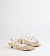 Style made simple with the Tied Together Strappy Kitten Heels in gold, trendy women’s shoes that take your outfit from basic to bold in one step.
