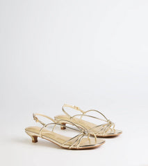 Style made simple with the Tied Together Strappy Kitten Heels in gold, trendy women’s shoes that take your outfit from basic to bold in one step.