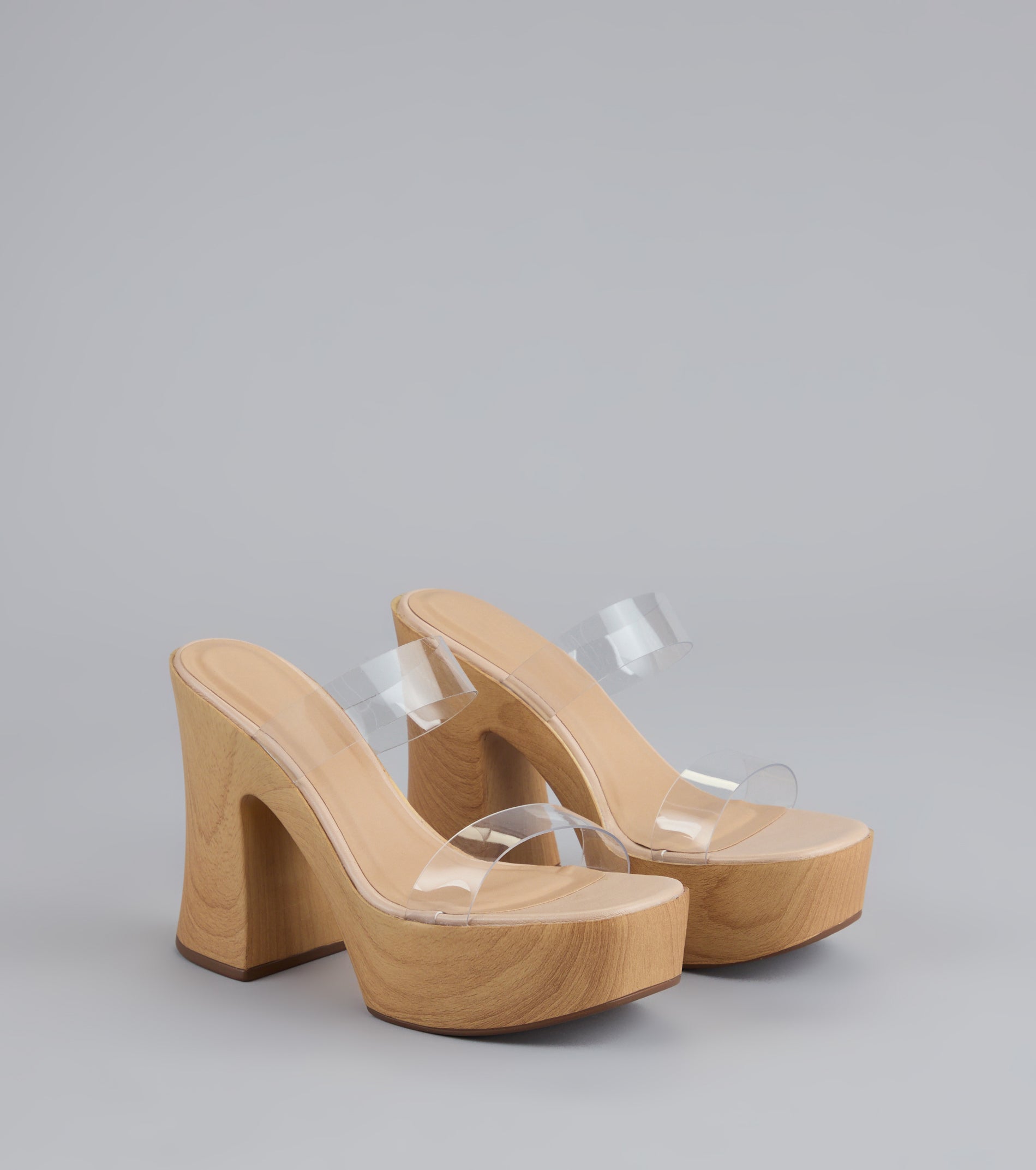 Style made simple with the Walk Tall Clear Strap Platform Block Heels, trendy women’s shoes that take your outfit from basic to bold in one step.