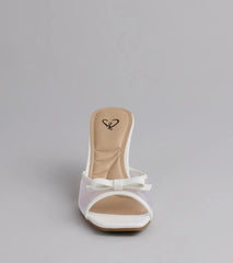 Style made simple with the Soft Glam Mesh Bow Mules in white, trendy women’s shoes that take your outfit from basic to bold in one step.