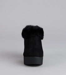 This black piece brings trend-right energy to the Fuzzy Feel Chunky Clog Mules, perfect for fall outfits that stand out.