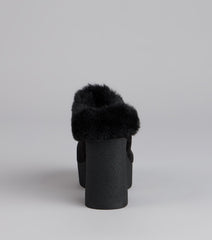 This black piece brings trend-right energy to the Fuzzy Feel Chunky Clog Mules, perfect for fall outfits that stand out.