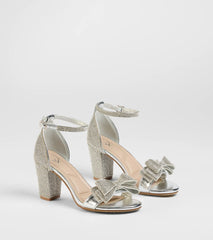 Style made simple with the Endless Glam Rhinestone Bow Block Heels in silver, trendy women’s shoes that take your outfit from basic to bold in one step.