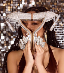 Elevate warm-weather looks with Endless Glam Rhinestone Bow Block Heels in silver, a pair of trendy sandals bringing chic, modern flair to every step.