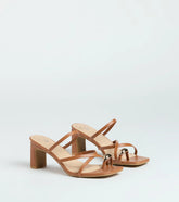 Style made simple with the Sweet Attraction Toe Ring Strappy Block Heels in tan, trendy women’s shoes that take your outfit from basic to bold in one step.