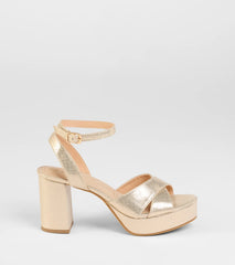 Get inspired with the Special Surprise Criss Cross Platform Block Heels, a feed-worthy gold piece that’s part of Windsor's updated and curated women’s clothing edit packed with must-have fall outfit ideas.