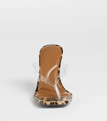 Style made simple with the Lady In Leopard Thong Stiletto Mules in leopard print, trendy women’s shoes that take your outfit from basic to bold in one step.