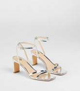 Style made simple with the So Obsessed Metallic Strappy Block Heels in silver, trendy women’s shoes that take your outfit from basic to bold in one step.