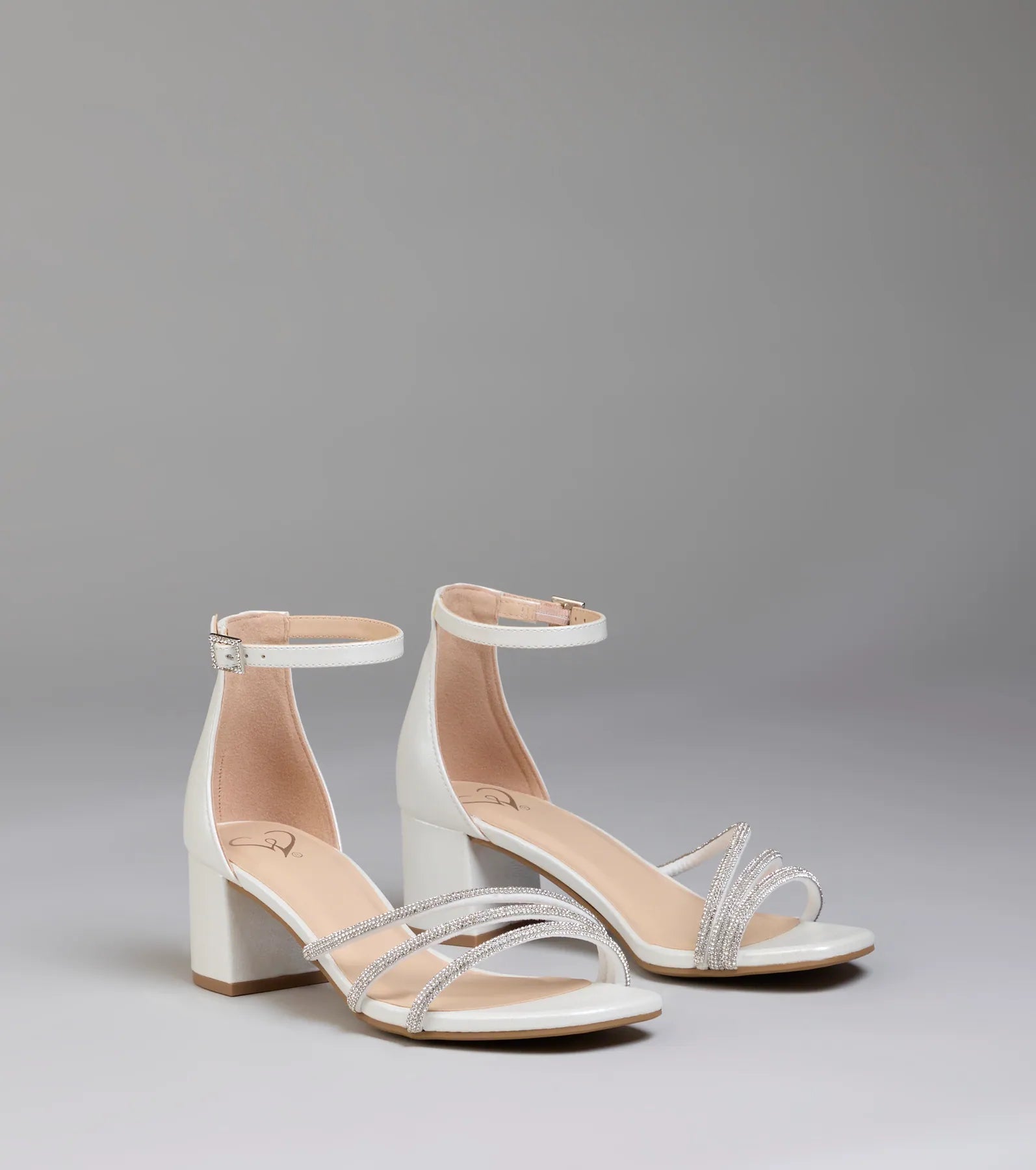 Style made simple with the Ultra Luxe Rhinestone Short Block Heels in pearl, trendy women’s shoes that take your outfit from basic to bold in one step.