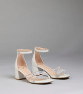 Style made simple with the Ultra Luxe Rhinestone Short Block Heels in pearl, trendy women’s shoes that take your outfit from basic to bold in one step.