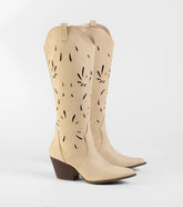 Style made simple with the Made For Dancing Laser Cut Cowboy Boots in taupe, trendy women’s shoes that take your outfit from basic to bold in one step.