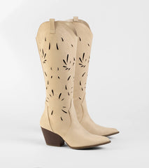 Style made simple with the Made For Dancing Laser Cut Cowboy Boots in taupe, trendy women’s shoes that take your outfit from basic to bold in one step.