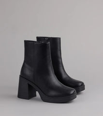 Style made simple with the Tough Love Platform Block Heel Booties in black, trendy women’s shoes that take your outfit from basic to bold in one step.