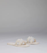 Style made simple with the Pop Of Luxe Sparkle Faux Pearl Rhinestone Sandals in ivory, trendy women’s shoes that take your outfit from basic to bold in one step.