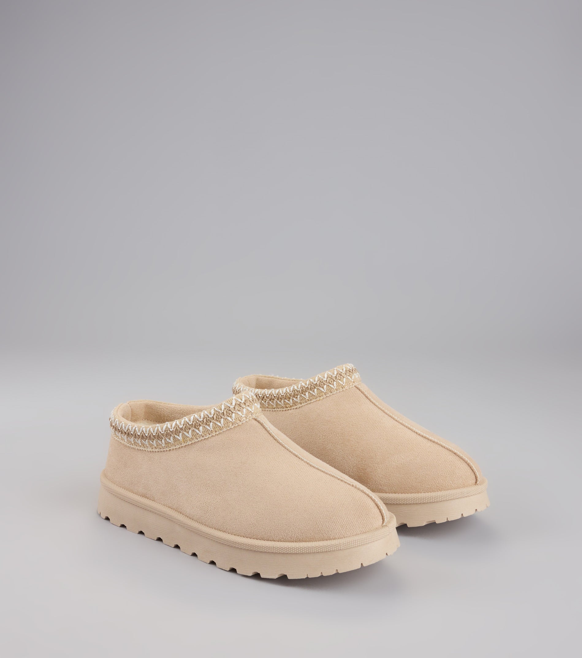 Style made simple with the Cozy Status Faux Suede Platform Slippers in beige, trendy women’s shoes that take your outfit from basic to bold in one step.