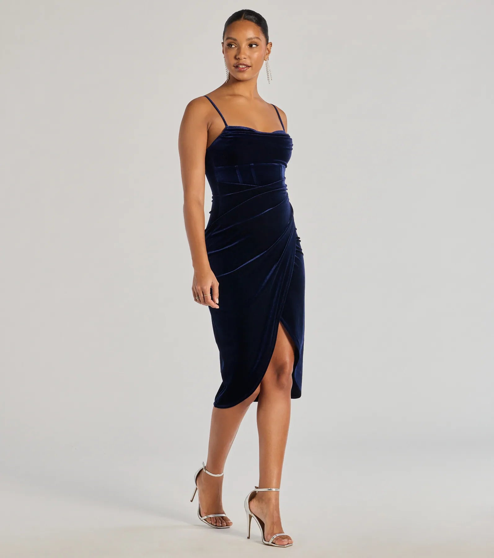 Make a bold statement in the Alice Corset Velvet Midi Formal Dress in navy blue, the perfect fall dress for weddings, cocktail hours, nights out, and/or seasonal celebrations.
