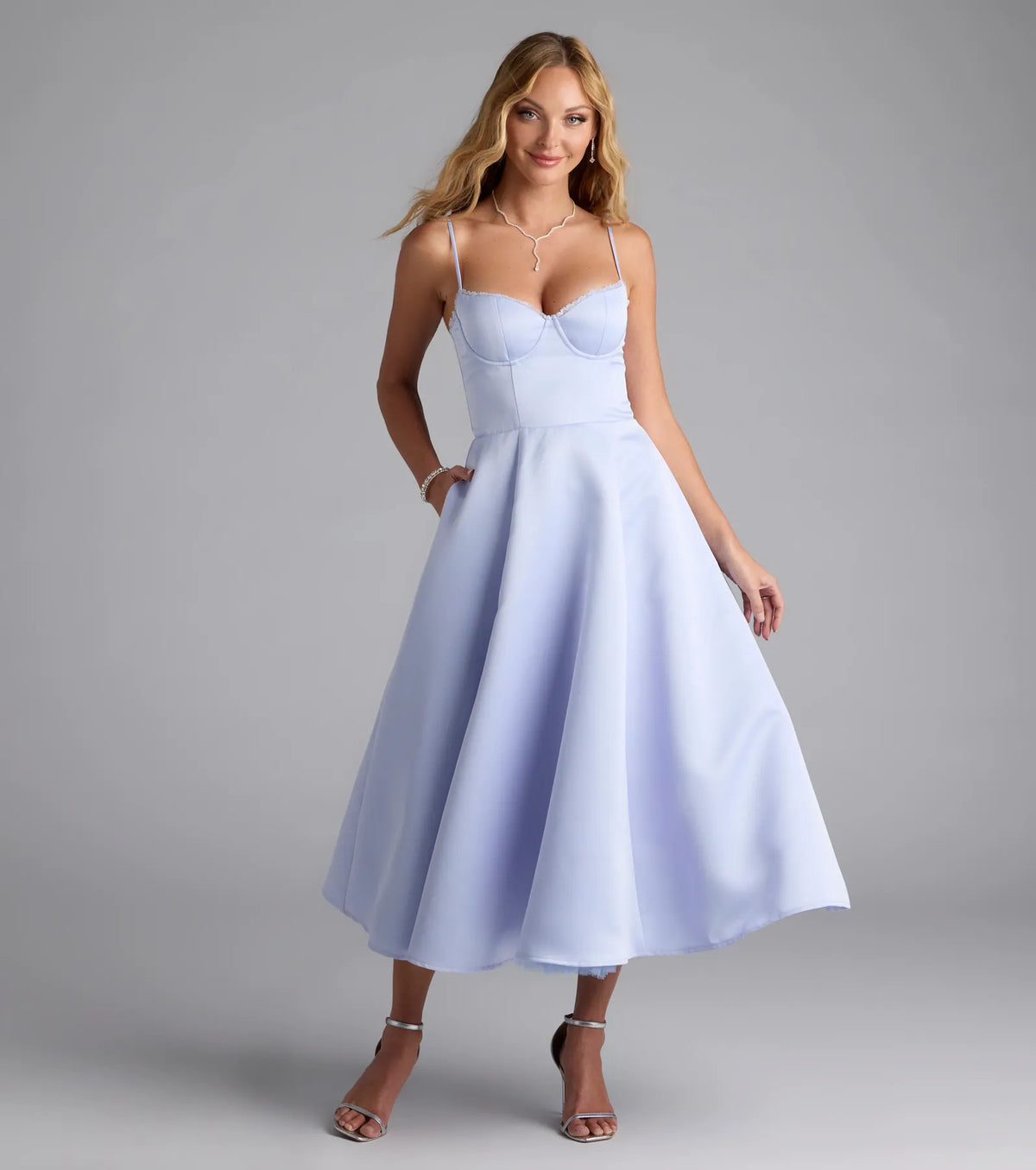 Feel instantly put-together in the Georgie Sweetheart A-Line Satin Midi Dress in light blue, a stylish wedding guest dress designed for confident style and all-out celebration.