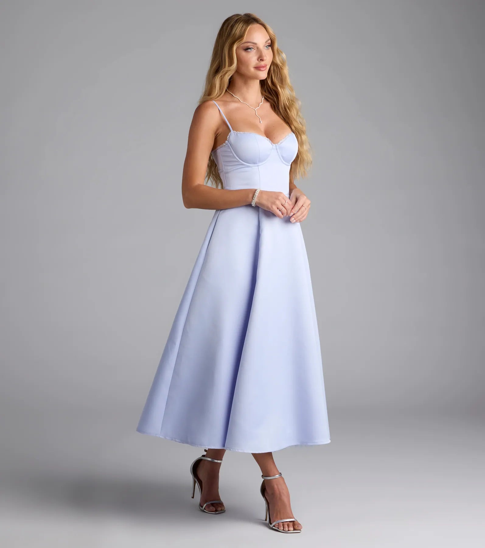 The Georgie Sweetheart A-Line Satin Midi Dress in light blue features a flattering fit and mid-calf hem, redefining effortless midi dresses for any occasion.