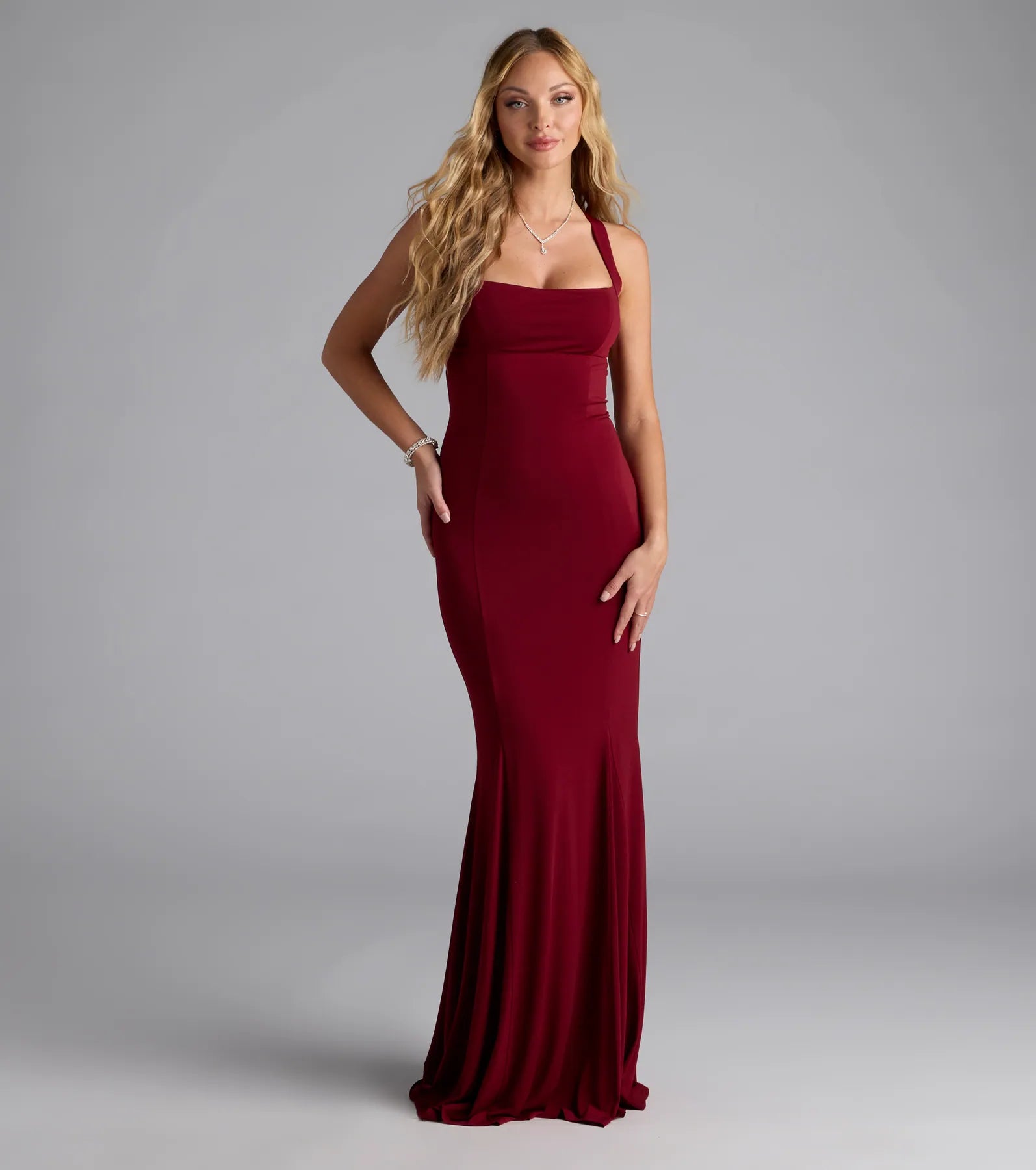 Feel instantly put-together in the Nicola Strappy Tie-Back Mermaid Dress in wine, a stylish wedding guest dress designed for confident style and all-out celebration.
