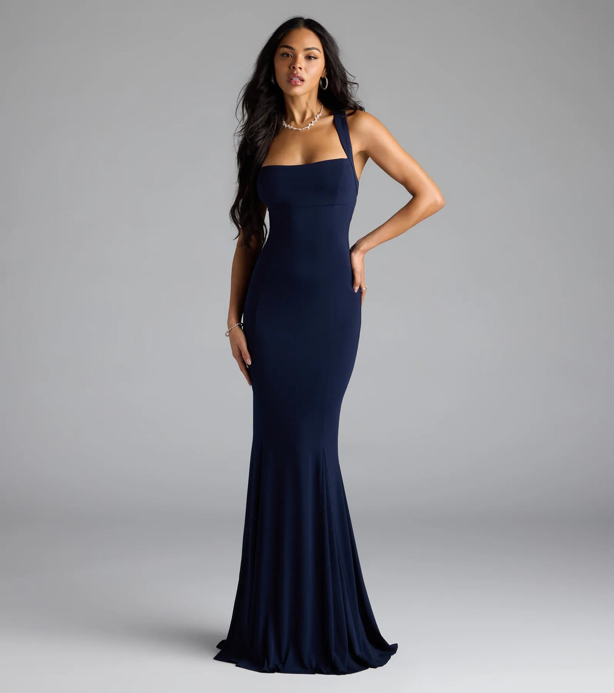 Feel instantly put-together in the Nicola Strappy Tie-Back Mermaid Dress in navy blue, a stylish wedding guest dress designed for confident style and all-out celebration.