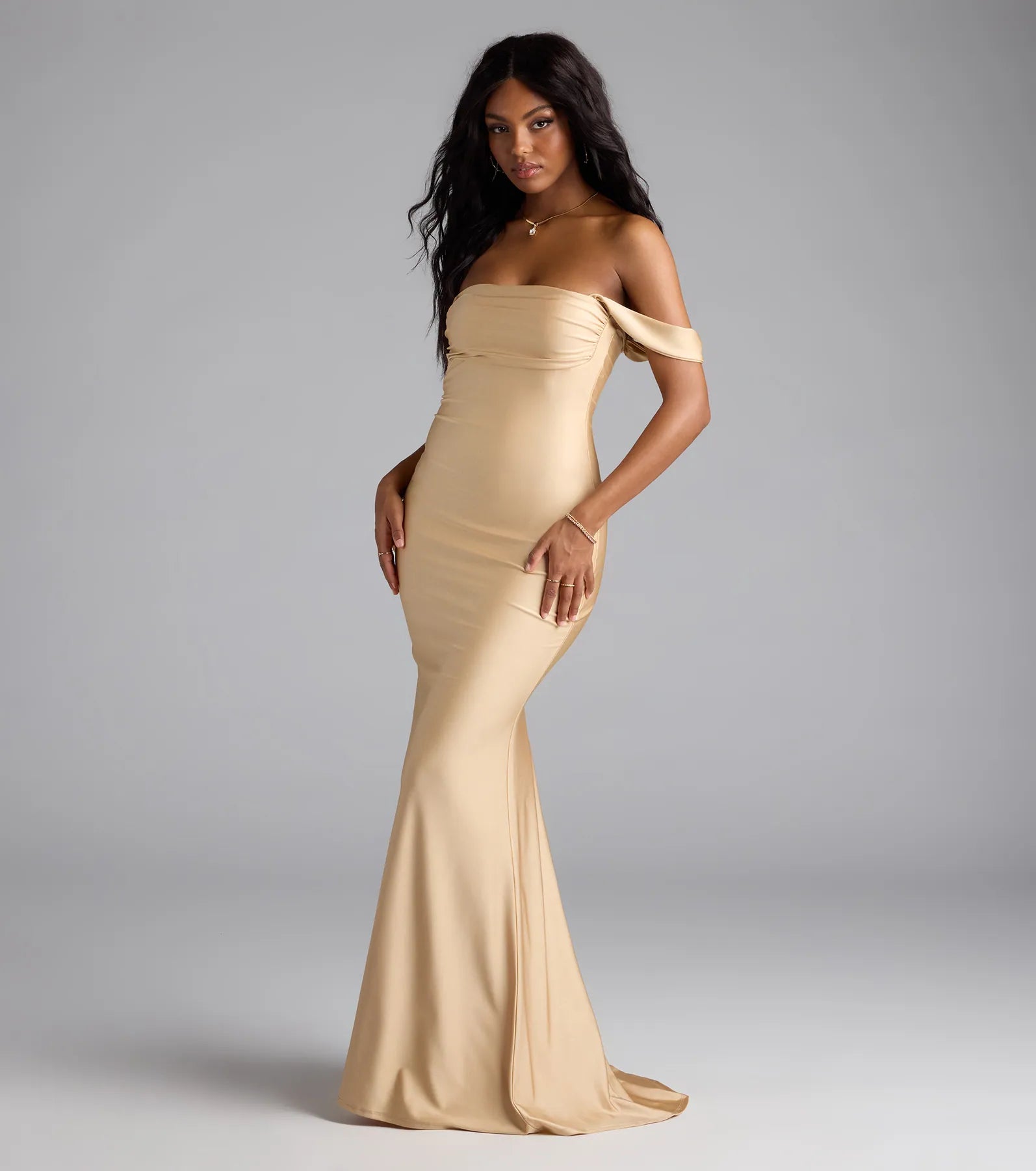 The Maylah Off-The-Shoulder Mermaid Dress is your new go-to gold dress—effortless, versatile, and made to update your fall style in seconds.
