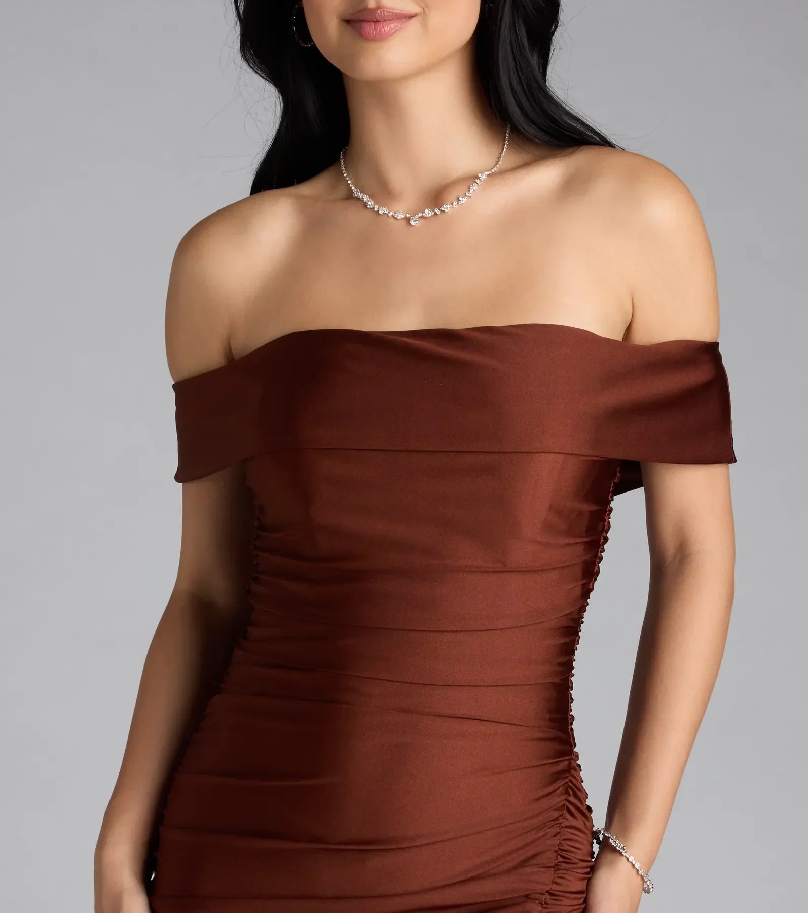 Own the spotlight in the Alicia Off-The-Shoulder Mermaid Formal Dress, a brown formal dress crafted to deliver luxe style for autumn weddings, Military Balls, or any special event.