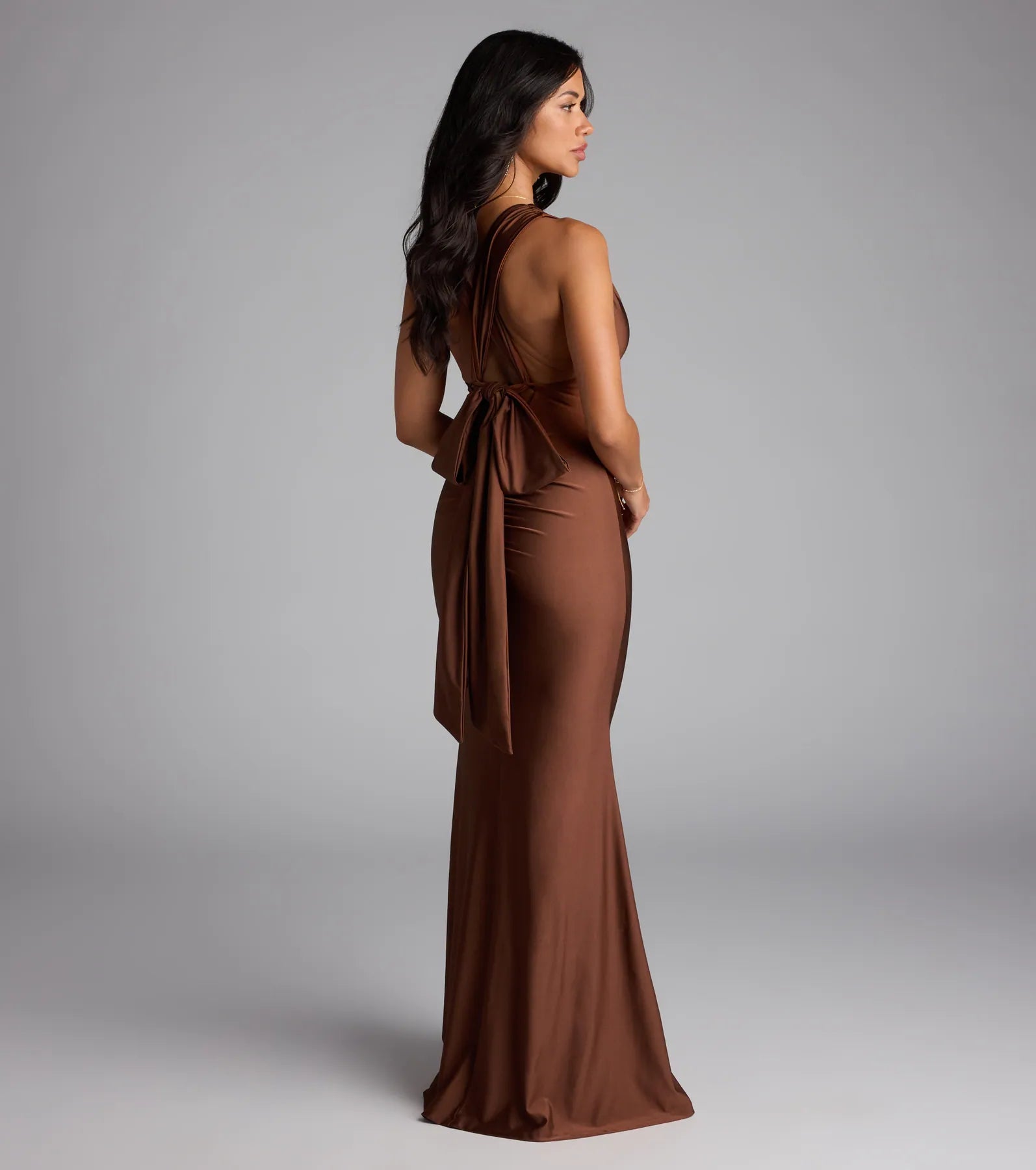 Own the spotlight in the Lucena Convertible Mermaid Formal Dress, a brown formal dress crafted to deliver luxe style for autumn weddings, Military Balls, or any special event.