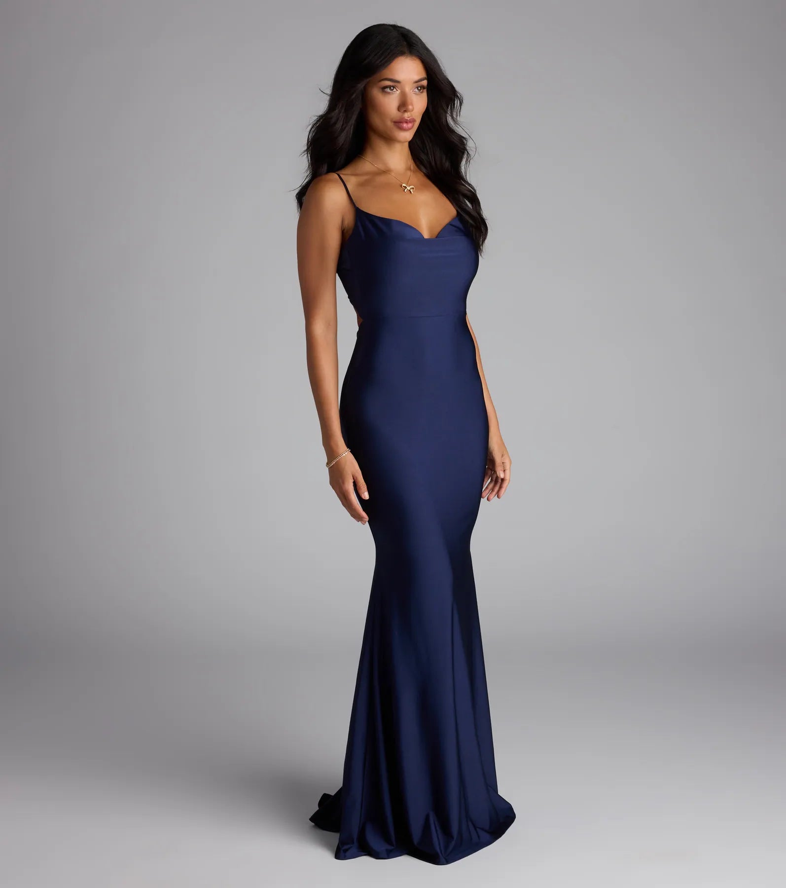 The Virginia Cowl Neck Tie-Back Mermaid Formal Dress is your new go-to navy blue dress—effortless, versatile, and made to update your fall style in seconds.