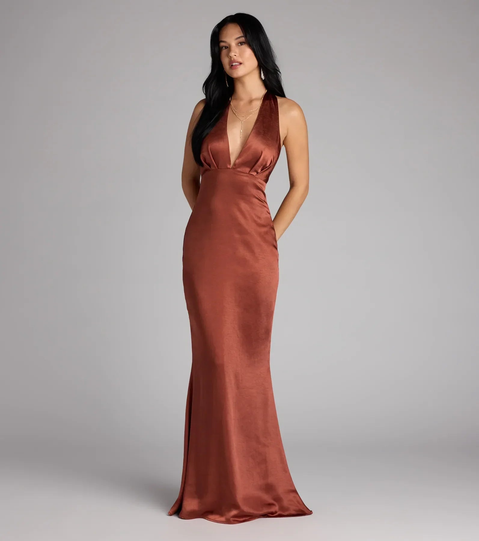 The Erika Halter Satin Column Formal Dress is your new go-to brown dress—effortless, versatile, and made to update your fall style in seconds.