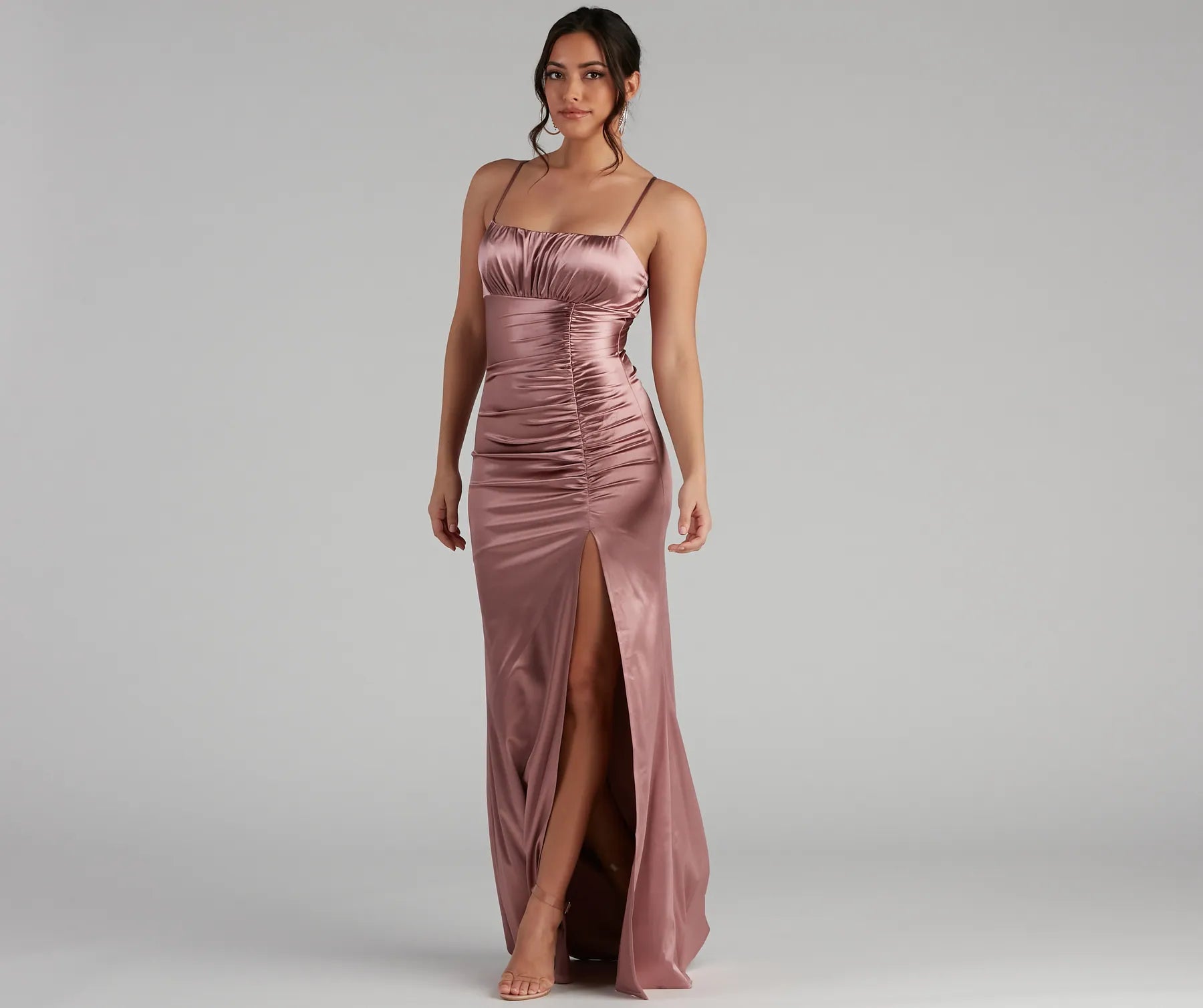 The elegant Brooklyn Satin Ruched Formal Dress is a mauve satin bridesmaid dress crafted with luxe fabric, ideal for modern weddings and traditional bridal parties.