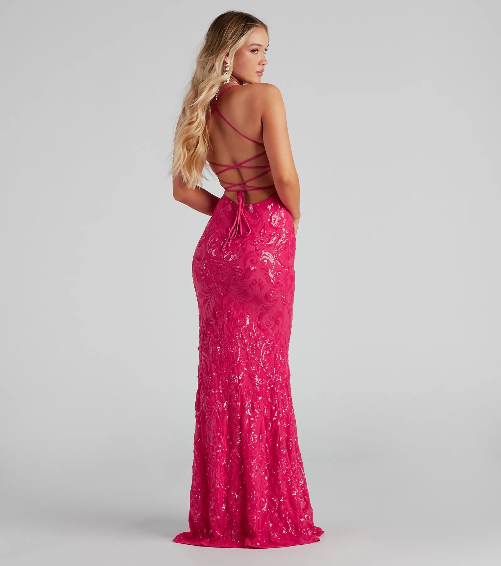 Style your seasonal looks with the Rowena Sequin Mermaid Dress, a trend-right, fuchsia fall dress designed for any plan on your calendar with new and unqiue details.