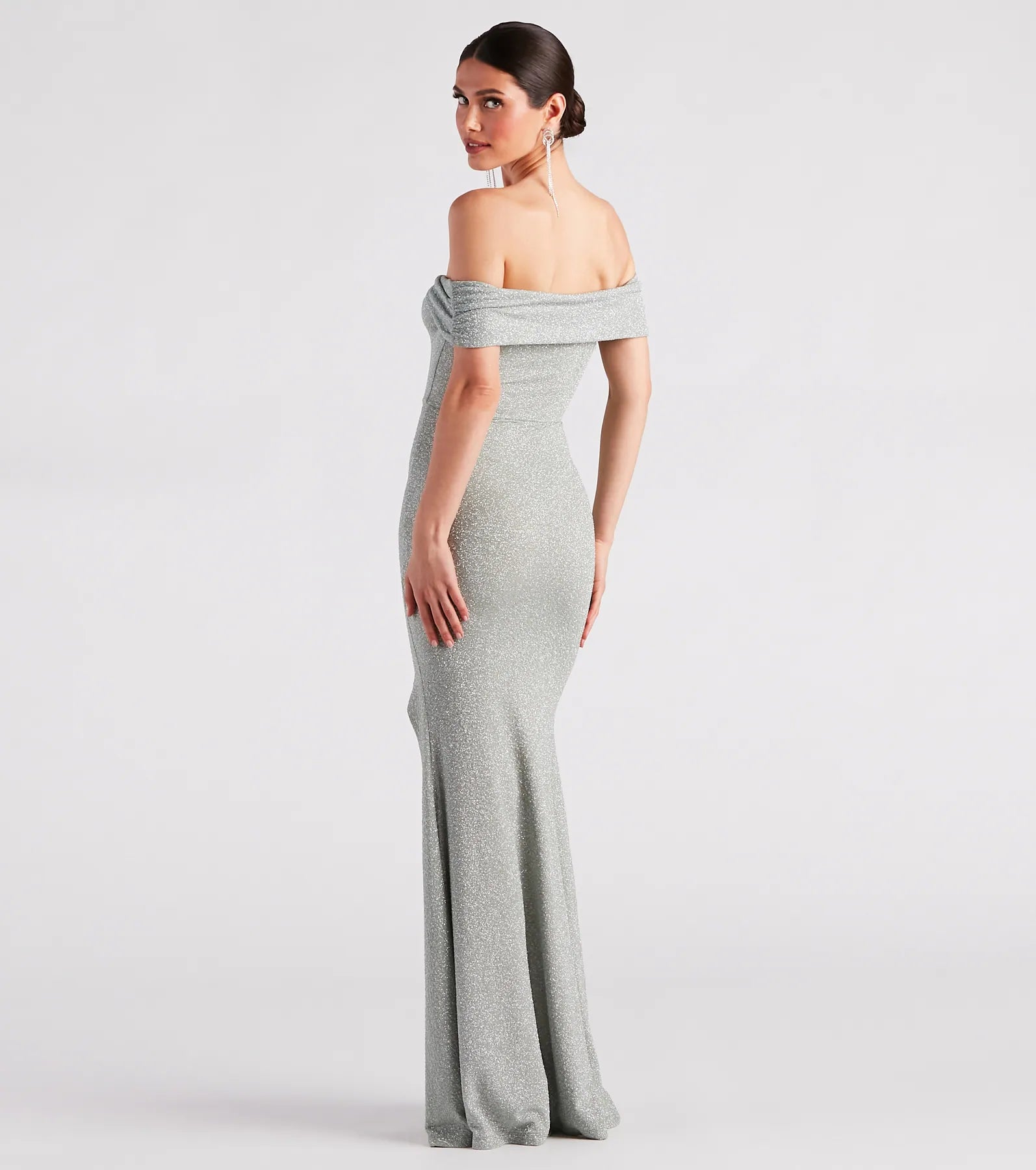 Celebrate in style with the Meryl Formal Glitter Long Dress, a sage green formal wedding guest dress featuring an elegant silhouette and luxe details, perfect for a black-tie celebration.