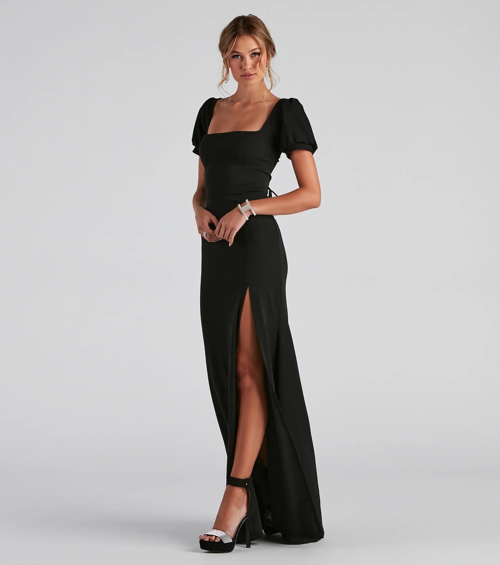 Turn heads at HOCO 2025 in this black homecoming dress, where statement-making details meet the iconic style of the Denali Formal Puff Sleeve Long Dress.