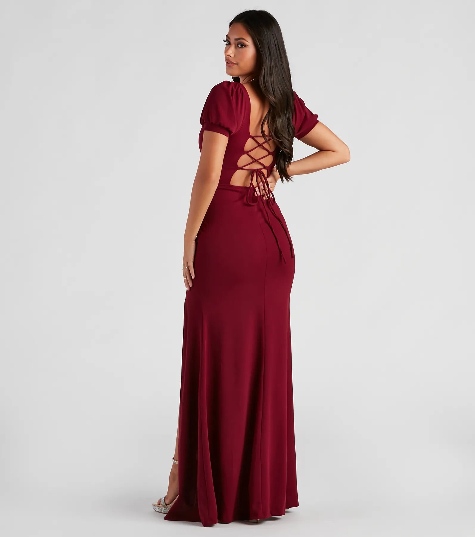 Make a bold statement in the Denali Formal Puff Sleeve Long Dress in burgundy, the perfect fall dress for weddings, cocktail hours, nights out, and/or seasonal celebrations.