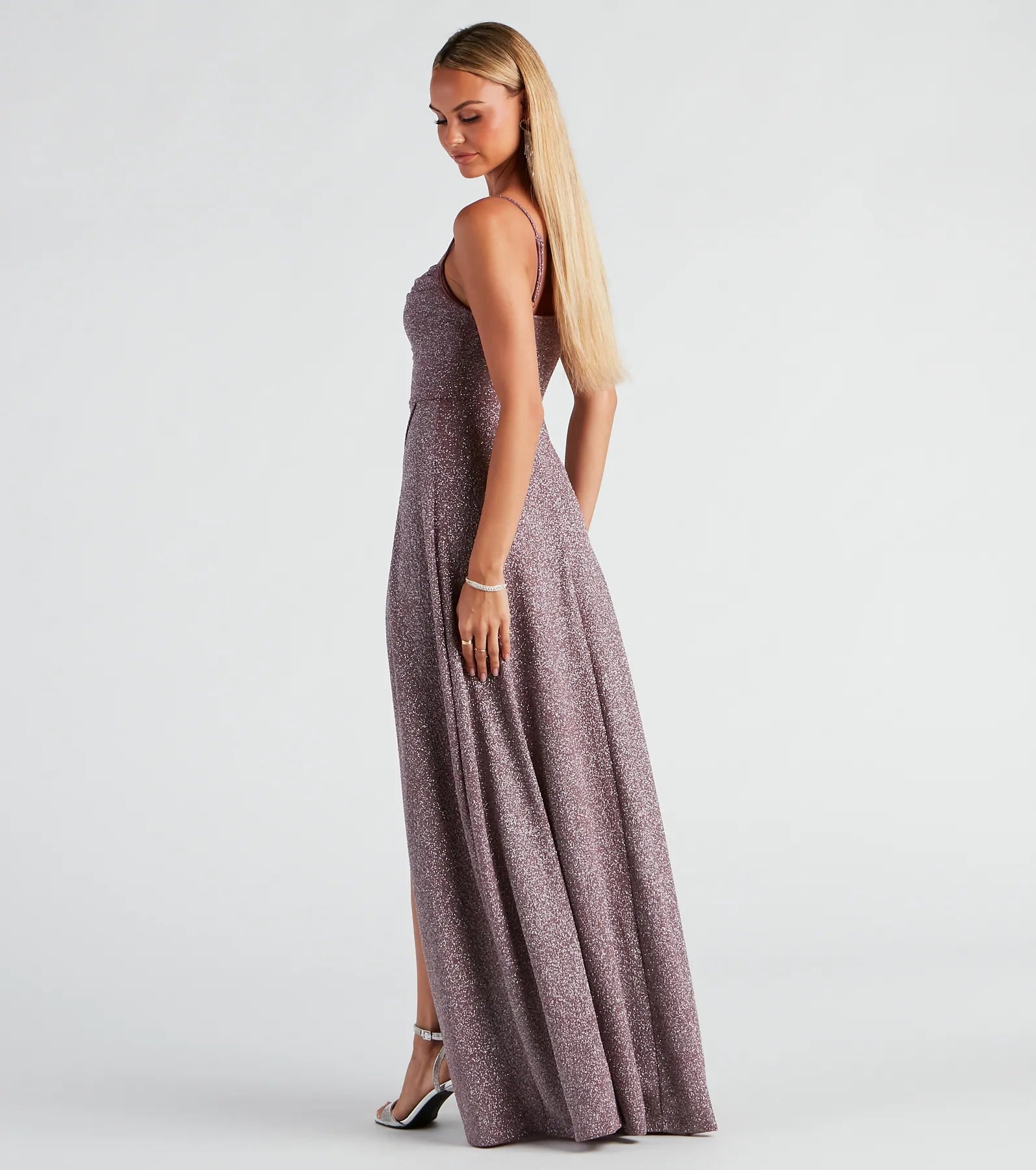 Own the spotlight in the Stephanie Formal Glitter A-Line Dress, a lavender formal dress crafted to deliver luxe style for fall weddings, military balls, or any special event.