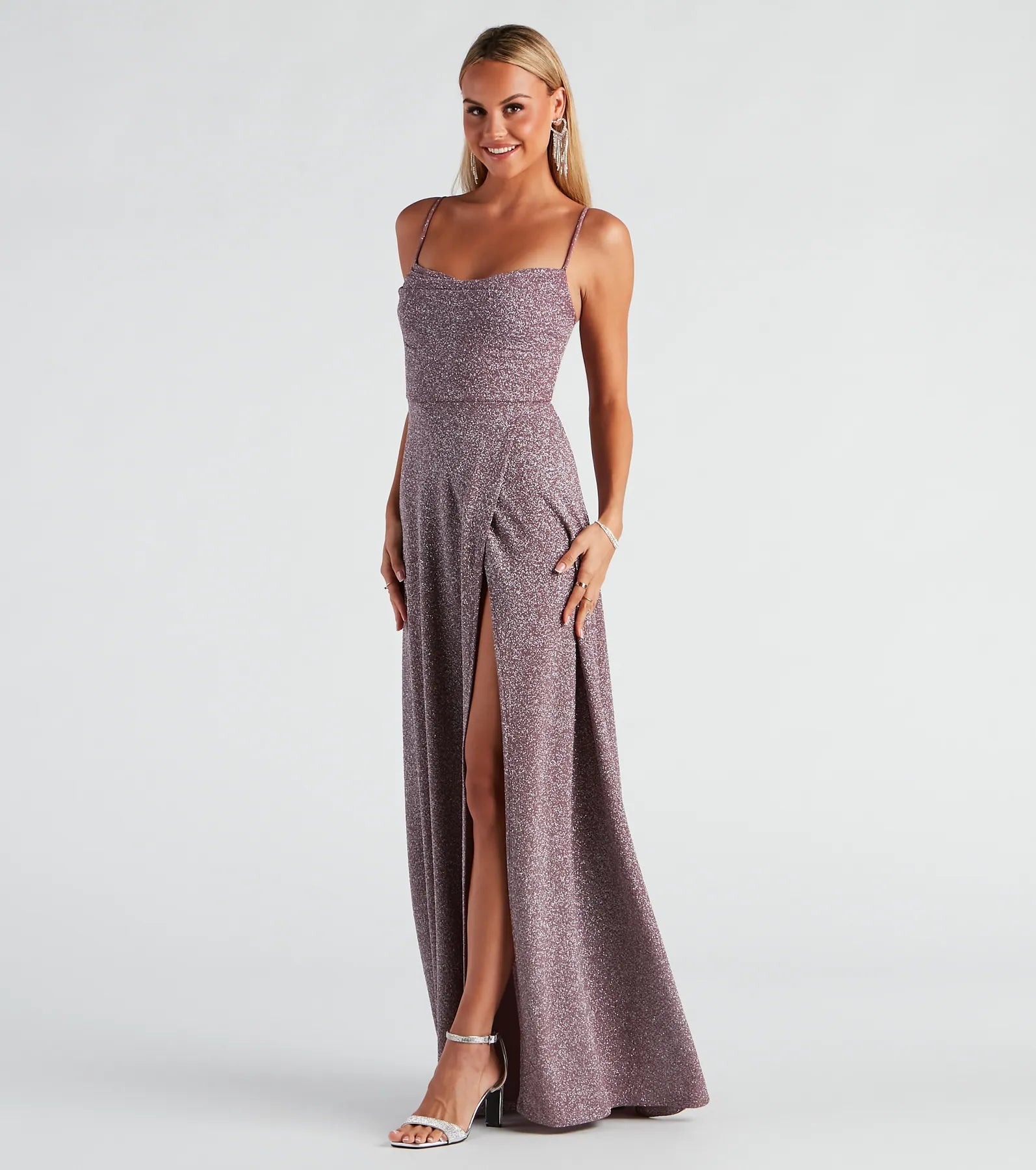 Make a bold statement in the Stephanie Formal Glitter A-Line Dress in lavender, the perfect fall dress for weddings, cocktail hours, nights out, and/or seasonal celebrations.