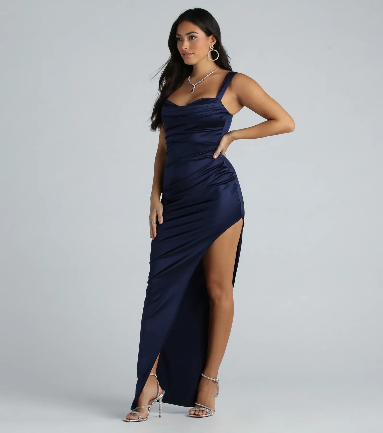 Make a bold statement in the Kirsten Satin Cowl Neck High Slit Formal Dress in navy blue, the perfect fall dress for weddings, cocktail hours, nights out, and/or seasonal celebrations.