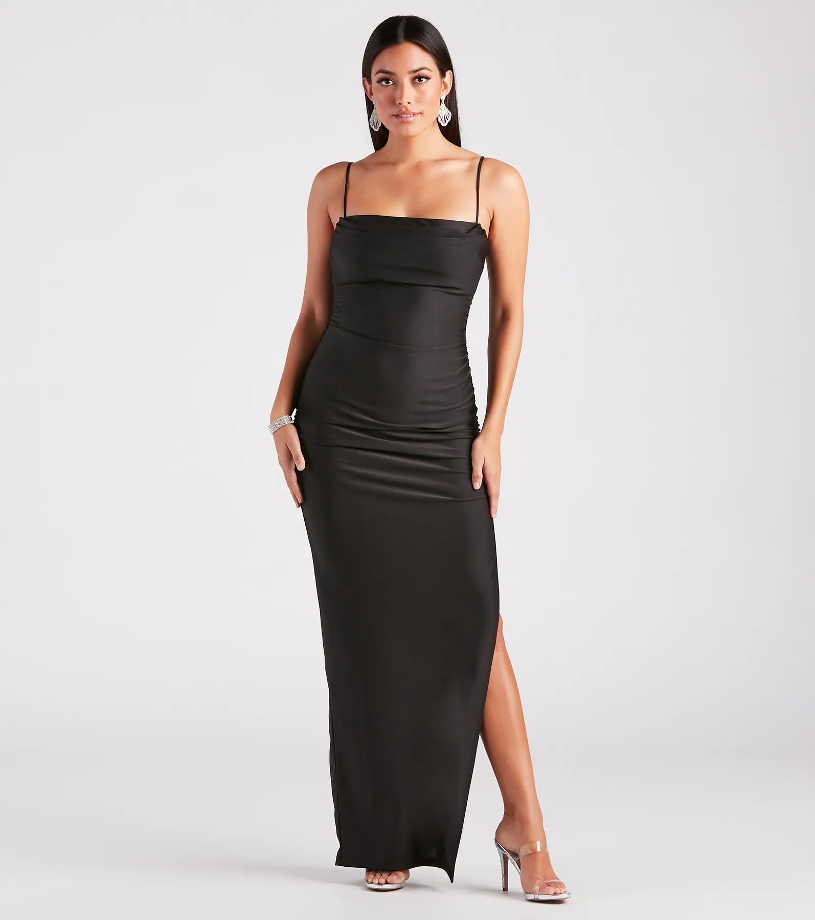 The Ella Cowl Neck Satin Dress is a flowy, black maxi dress that moves with you from sunny days to elevated nights in effortless style.