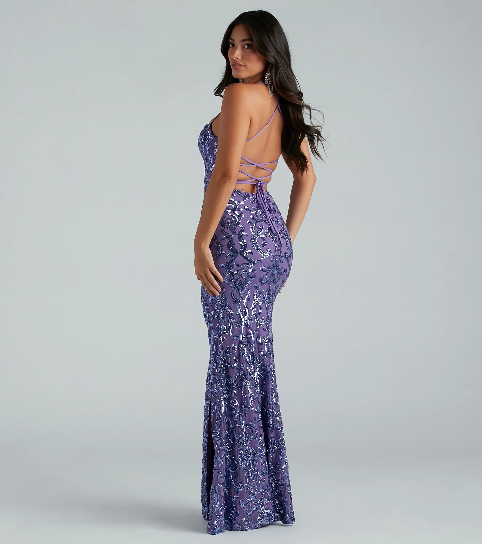 Feel ready for every dance floor moment or feed-worthy reel in the Rowena Sequin Mermaid Dress, a purple homecoming dress designed to own your moment.