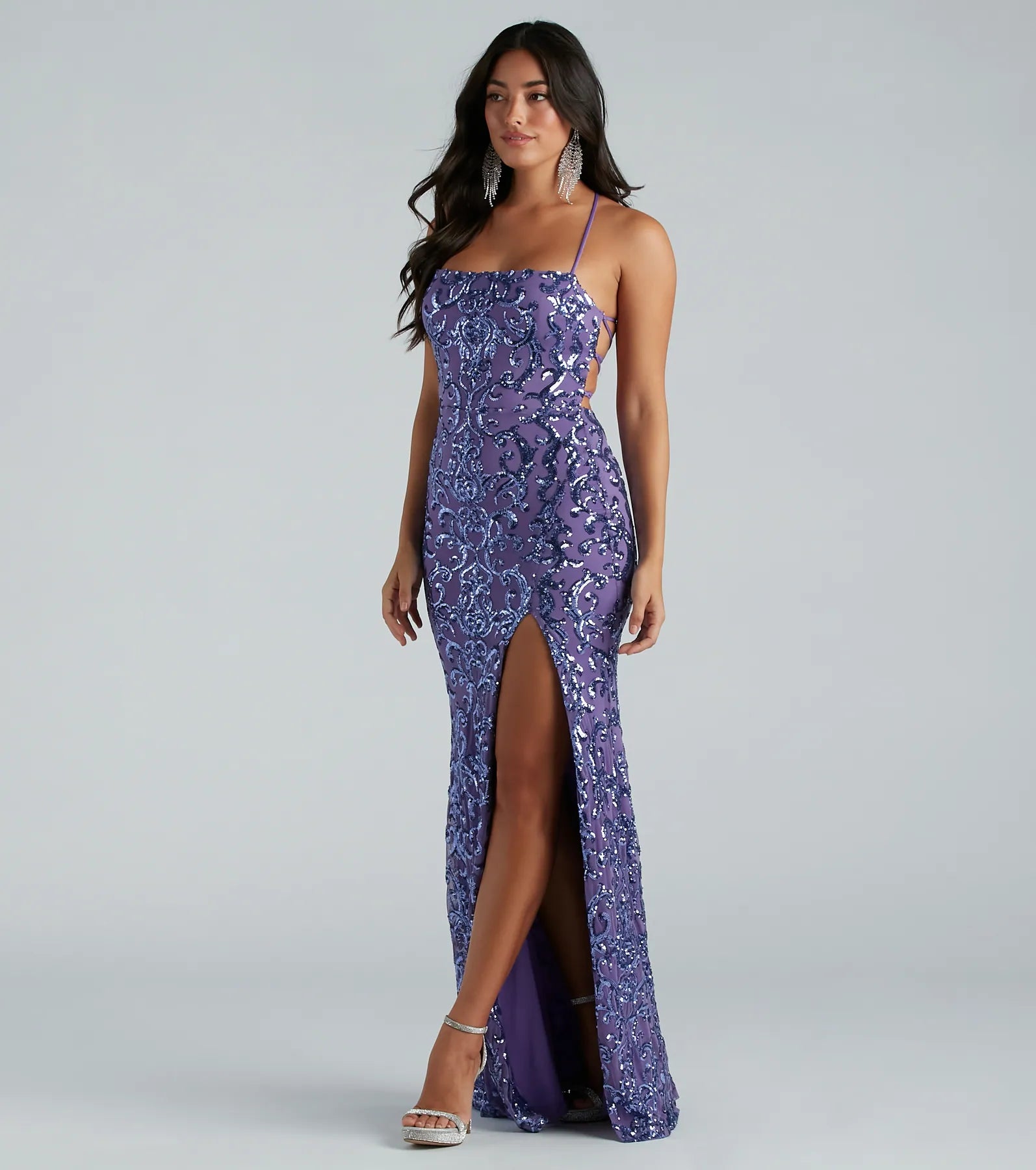 Make a bold statement in the Rowena Sequin Mermaid Dress in purple, the perfect fall dress for weddings, cocktail hours, nights out, and/or seasonal celebrations.